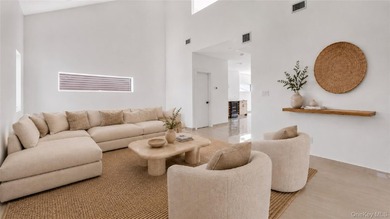 Welcome to elevated coastal living in this newly constructed - photo 11