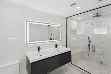 Welcome to elevated coastal living in this newly constructed - photo 15