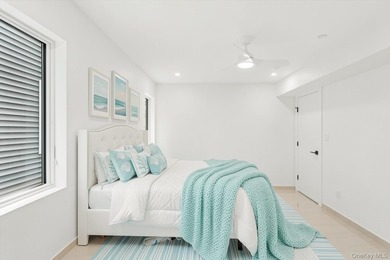 Welcome to elevated coastal living in this newly constructed - photo 18