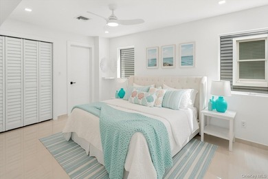 Welcome to elevated coastal living in this newly constructed - photo 19