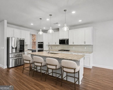 Welcome to this beautiful home located just minutes from the - photo 2
