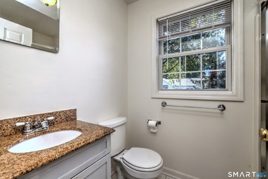 This gorgeous, sun-splashed end-unit townhouse-originally the