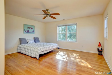 This gorgeous, sun-splashed end-unit townhouse-originally the