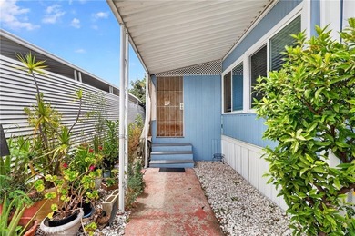 Welcome to this inviting 3-bedroom, 2-bath mobile home offering - photo 3
