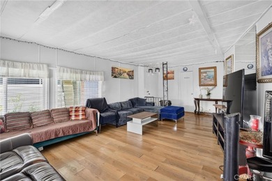 Welcome to this inviting 3-bedroom, 2-bath mobile home offering - photo 9