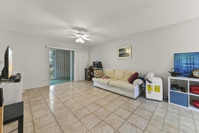 Welcome to this charming corner/end-unit condominium in Golfs - photo 5