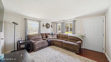 Opportunity awaits! This solid concrete block home offers plenty - photo 3