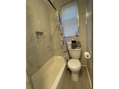 Detached all brick three family building full basement with - photo 4