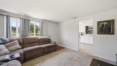 Opportunity awaits! This solid concrete block home offers plenty - photo 4