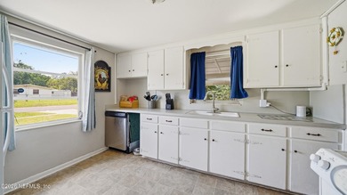 Opportunity awaits! This solid concrete block home offers plenty - photo 5