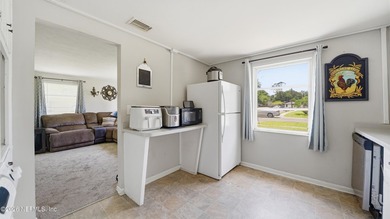 Opportunity awaits! This solid concrete block home offers plenty - photo 6