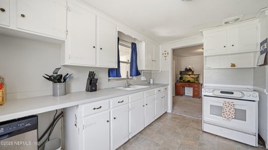 Opportunity awaits! This solid concrete block home offers plenty - photo 8
