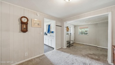 Opportunity awaits! This solid concrete block home offers plenty - photo 10