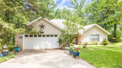 Nestled in the picturesque Big Lake area of Caddo Lake - Lake Home For Sale in Karnack, Texas