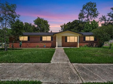 Welcome home to this charming brick 3-bedroom, 2-bath residence - photo 1