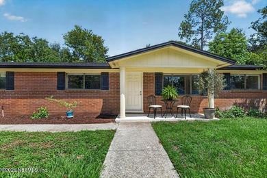 Welcome home to this charming brick 3-bedroom, 2-bath residence - photo 2