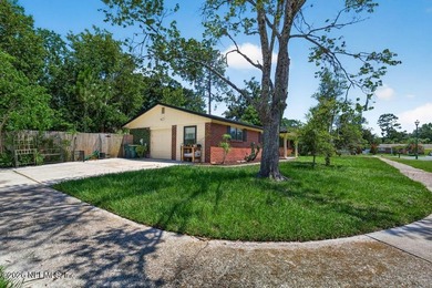 Welcome home to this charming brick 3-bedroom, 2-bath residence - photo 3