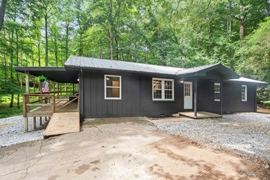 This beautifully updated single story ranch home is nestled on a