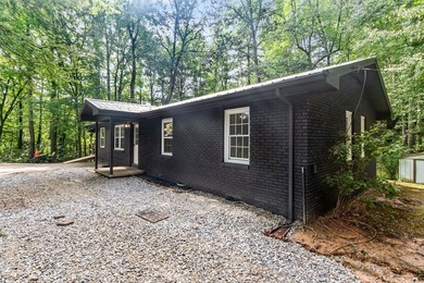 This beautifully updated single story ranch home is nestled on a