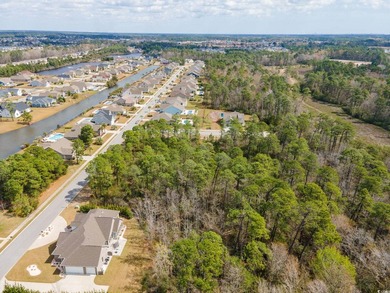 A magnificent wooded corner approximately 1/2 acre lot that is a - photo 12