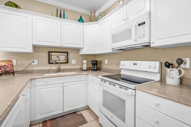 Beautifully updated and meticulously maintained, this top floor