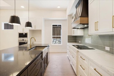 Experience elevated living in this exceptional one story new