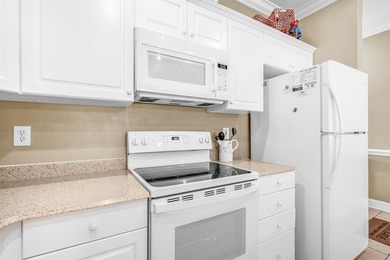 Beautifully updated and meticulously maintained, this top floor