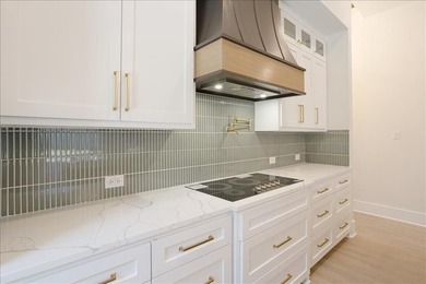 Experience elevated living in this exceptional one story new