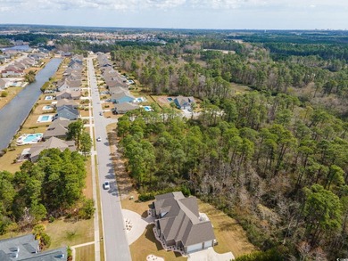 A magnificent wooded corner approximately 1/2 acre lot that is a - photo 16