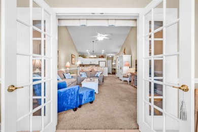 Beautifully updated and meticulously maintained, this top floor