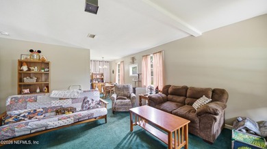 Located in the Spring Park neighborhood, this 3-bedroom, 1-bath - photo 4