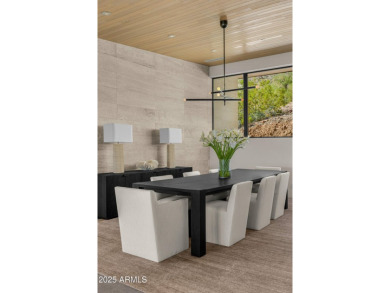 Positioned on a serene hillside Paradise Reserve, this modern