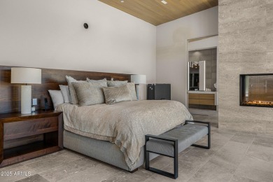 Positioned on a serene hillside Paradise Reserve, this modern