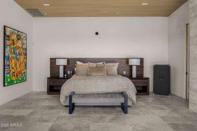 Positioned on a serene hillside Paradise Reserve, this modern