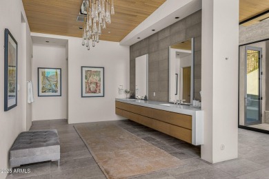 Positioned on a serene hillside Paradise Reserve, this modern