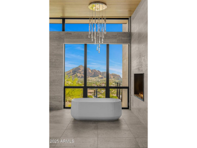 Positioned on a serene hillside Paradise Reserve, this modern