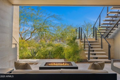 Positioned on a serene hillside Paradise Reserve, this modern