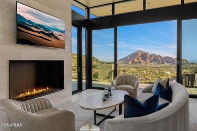 Positioned on a serene hillside Paradise Reserve, this modern