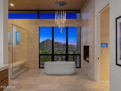 Positioned on a serene hillside Paradise Reserve, this modern