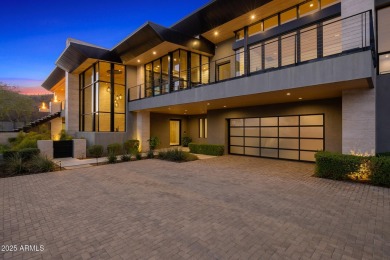 Positioned on a serene hillside Paradise Reserve, this modern