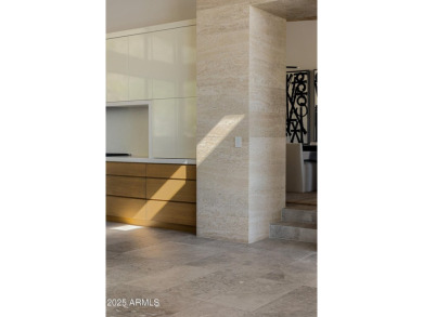 Positioned on a serene hillside Paradise Reserve, this modern