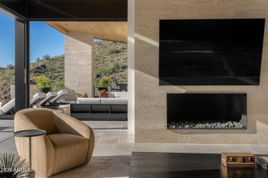 Positioned on a serene hillside Paradise Reserve, this modern