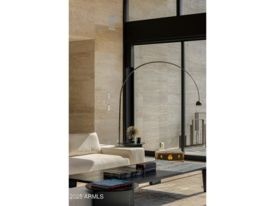 Positioned on a serene hillside Paradise Reserve, this modern