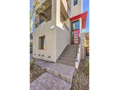 Experience elevated living in this 4-story modern architectural