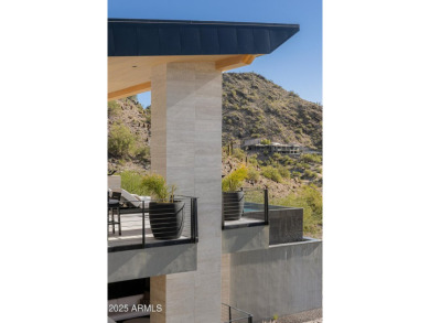 Positioned on a serene hillside Paradise Reserve, this modern