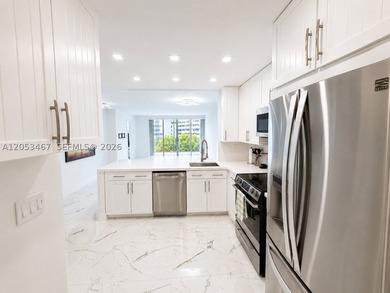 Beautifully remodeled 2-bedroom + den, 2-bath residence has the - photo 4