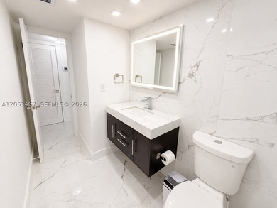 Beautifully remodeled 2-bedroom + den, 2-bath residence has the - photo 9