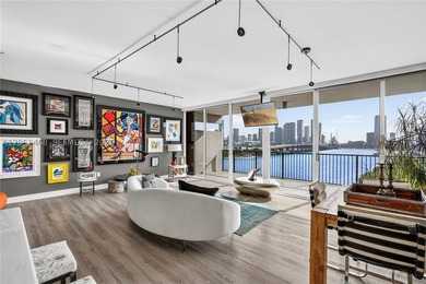 Direct open bay and city views set the stage for this modern - photo 3