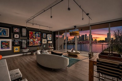 Direct open bay and city views set the stage for this modern - photo 4