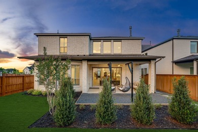Impressive two-story entry into this stunning, model-like home - photo 5